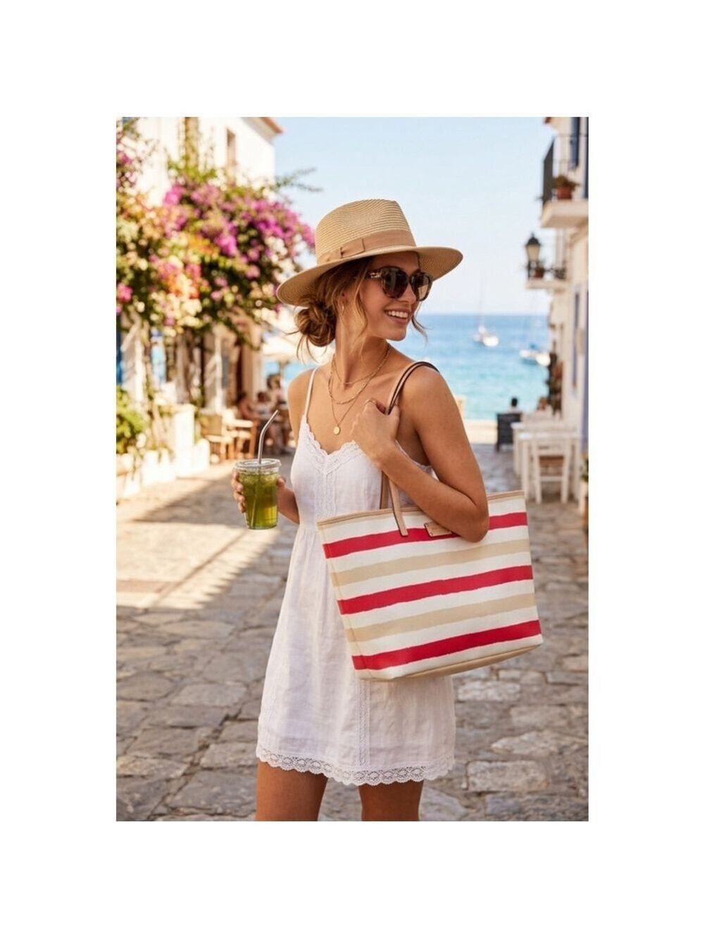Kate Spade Bondi Road Harmony tote bag features a pink, cream, and white stripe